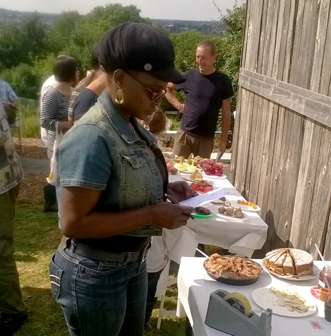 Deliberating over the cakes. The coffee sponge (on right) took 1st prize – moist and full of flavour. Apple cake came 2nd. Apple cake was made with apples from the allotment orchard.