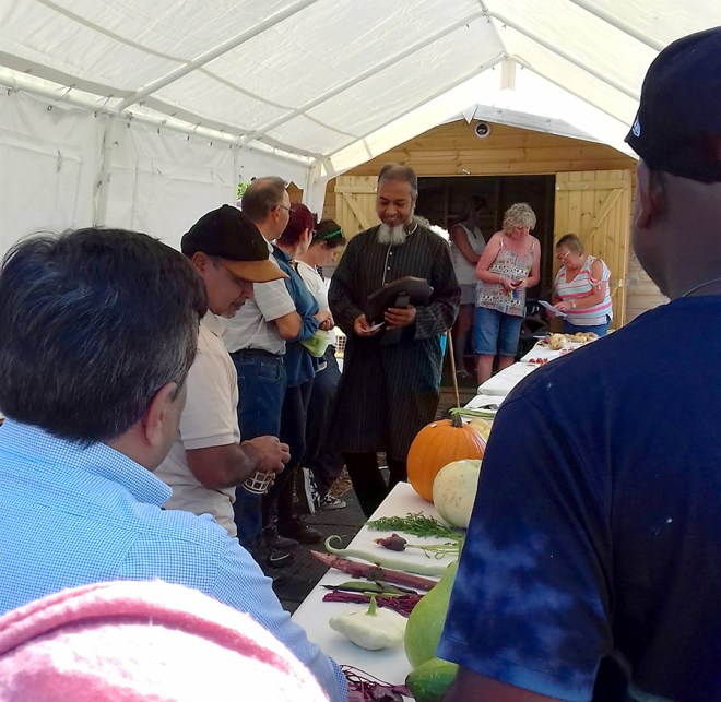 Prize giving in progress. The winner of the Joe Moriarty memorial shield for ‘Plot Holder of the Year’ is looking very pleased.