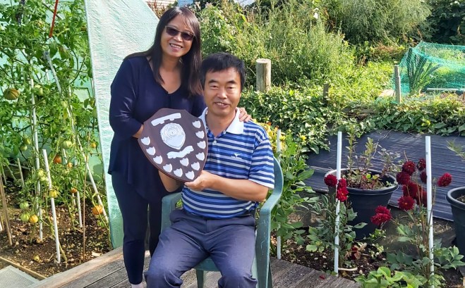 Peter and Joy with the trophy shield
