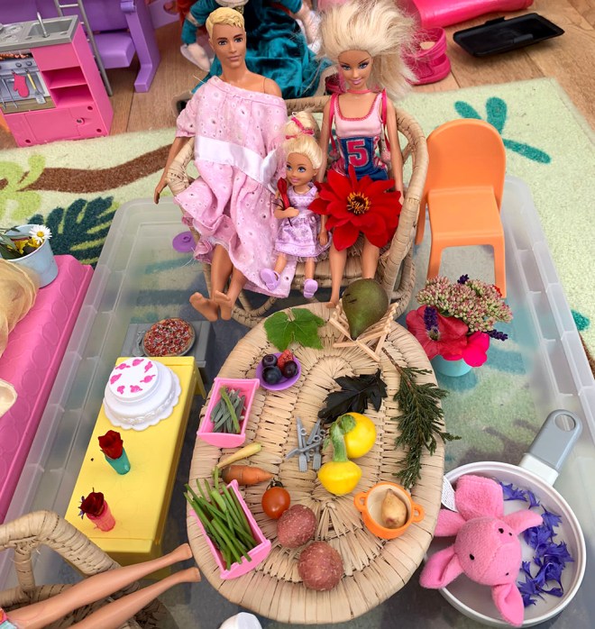 Barbie and Ken enjoying a spread of micro sized fruit and veg harvested at the show