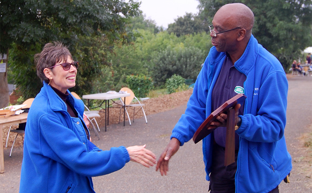 Chairman Ray presenting Gill with the prestigious 'Plot Holder of the Year' plaque