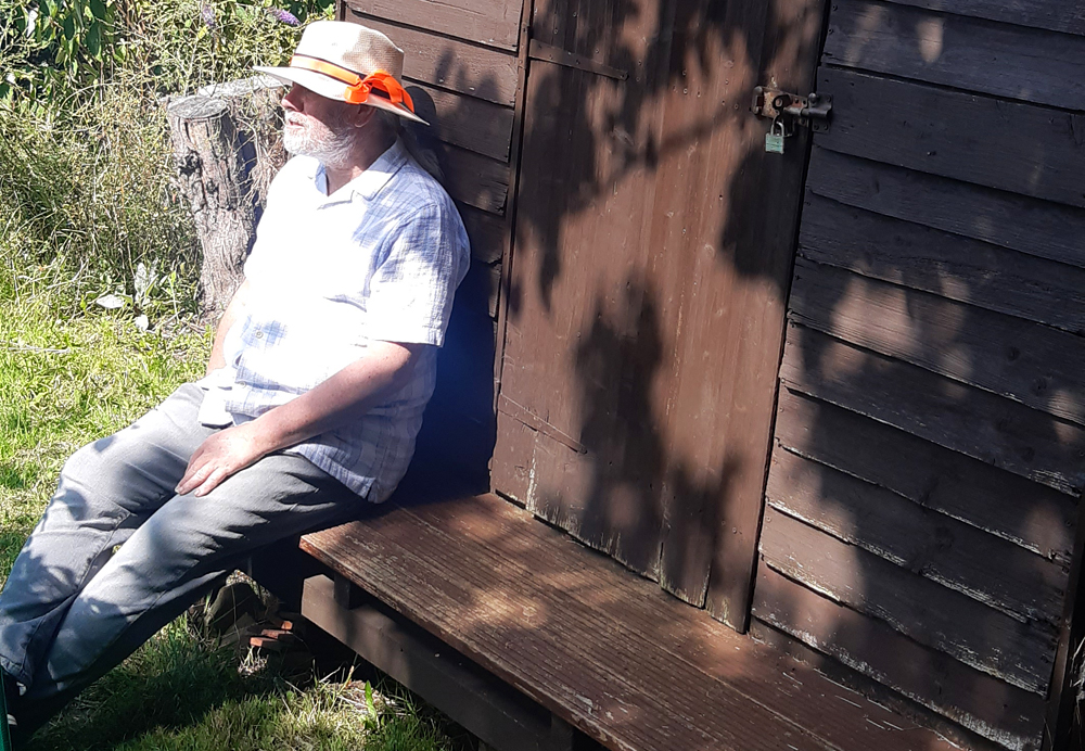 peter sitting on shed veranda 2023